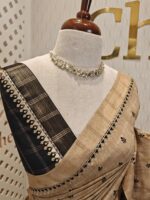 Semi tussar with check pattern and small triangle shapes on border - Image 2