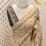 Semi tussar with check pattern and geometric like design