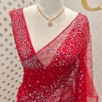 Net saree with sequence, stones small floral pattern and scallop border
