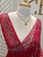 Net saree with sequence, stones small floral pattern and scallop border - Image 3