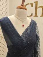 Net saree with embroidered sequence leafs and vines ,cutwork and scallop on border - Image 18
