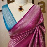 Banarasi with floral,leaf motif and zigzag border and contrast blouse