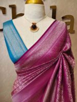 Banarasi with floral,leaf motif and zigzag border and contrast blouse