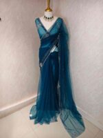 Net saree with cutbead floral design and sequence work on border - Image 19
