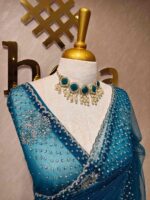 Net saree with cutbead floral design and sequence work on border - Image 18