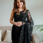 Net saree with sequence, beads floral jaal design and big paisely design
