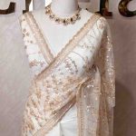 Net saree with beads, sequence floral and wavy lines design