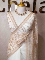 Net saree with beads, sequence floral and wavy lines design
