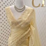 Tissue organza with mango shaped pearl embroidery design on border