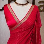 Viscose with small check pattern and self colour boarder