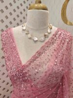 Net saree with sequence, stones small floral pattern and scallop border - Image 50
