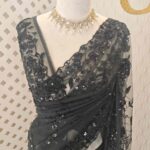 Net saree with sequence, cut beads half of flower like design and jaal pattern
