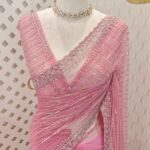 Net saree with cutbead and sequence work on horizontal direction