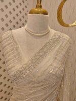 Net saree with cutbead and sequence work on horizontal direction - Image 35