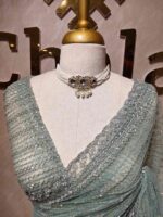Net saree with cutbead and sequence work on horizontal direction - Image 10