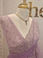 Net saree with intricate floral embroidery along the border - Image 15