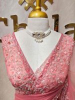 Net saree with intricate floral embroidery along the border - Image 11