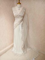 Net saree with intricate floral and vine embroidery along the border - Image 16