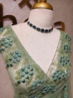 Net saree with intricate floral and vine embroidery along the border - Image 19