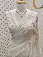 Organza with Turkish floral applique, sequence, cut beads work and shadow work on border