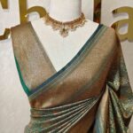 Soft katan silk with simple flower buttas and zigzag, diamond like zari border