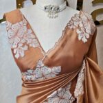 Tissue silk with floral applique work and scallop border