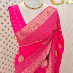 Viscose with bud like motif and wide border with check pattern