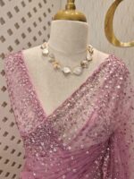 Net saree with sequence, stones small floral pattern and scallop border - Image 59