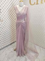 Net saree with intricate floral embroidery along the border - Image 19