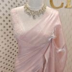 Georgette saree with net blouse floral applique and pearl, bead embellishments
