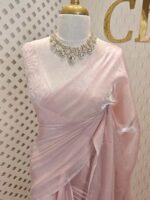 Georgette saree with net blouse floral applique and pearl, bead embellishments