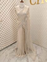 Net saree with cutbead and sequence work on horizontal direction - Image 21