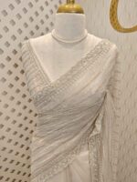 Net saree with cutbead and sequence work on horizontal direction - Image 25