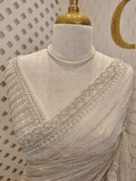 Net saree with cutbead and sequence work on horizontal direction - Image 26