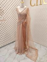 Net saree with sequence and zigzag cut bead border - Image 45