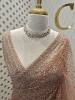 Net saree with sequence and zigzag cut bead border - Image 44