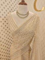Net saree with sequence and zigzag cut bead border - Image 34