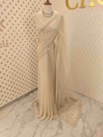 Net saree with sequence and zigzag cut bead border - Image 36