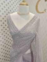Net saree with sequence and zigzag cut bead border - Image 19