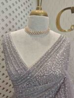 Net saree with sequence and zigzag cut bead border - Image 20