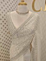 Net saree with sequence and zigzag cut bead border - Image 16