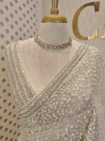 Net saree with sequence and zigzag cut bead border - Image 17