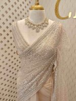 Net saree with sequence and zigzag cut bead border - Image 10