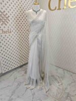 Net saree with sequence and zigzag cut bead border - Image 9