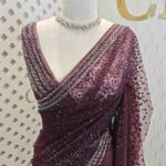 Net saree with sequence and zigzag cut bead border
