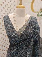 Organza with vertical metallic looking thread and decorative scallop boarder - Image 17