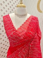 Organza with vertical metallic looking thread and decorative scallop boarder - Image 2