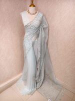 Organza with vertical metallic looking thread and decorative scallop boarder - Image 6
