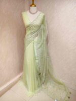 Organza with vertical metallic looking thread and decorative scallop boarder - Image 15