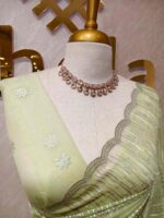 Organza with vertical metallic looking thread and decorative scallop boarder - Image 14